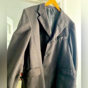 Like New wool Burberry coat.  The color is a blend between brown and black.